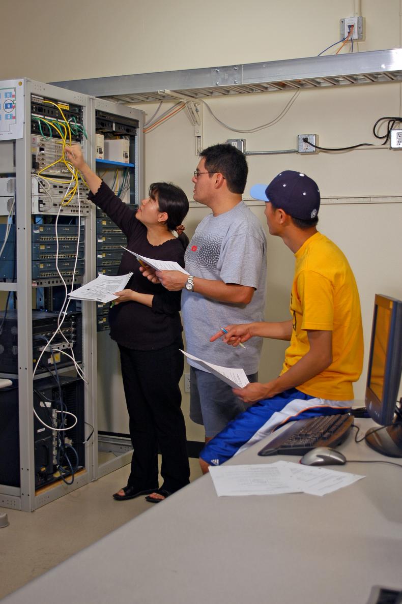 Graduate students working in the engineering lab